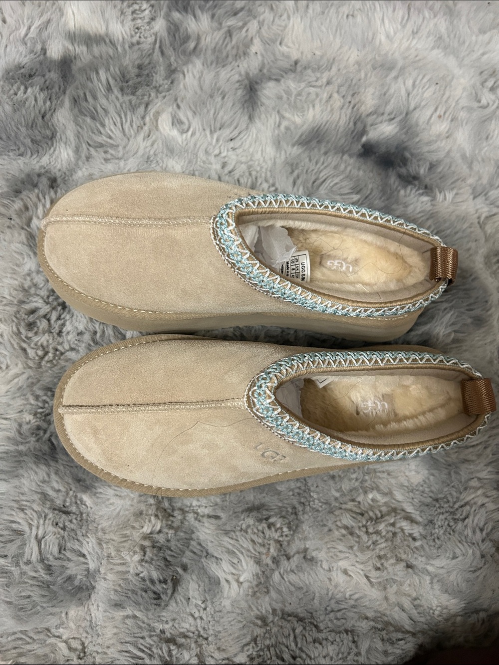 UGG Women's Slip-On Suede Slippers in Sand with Aqua Trim